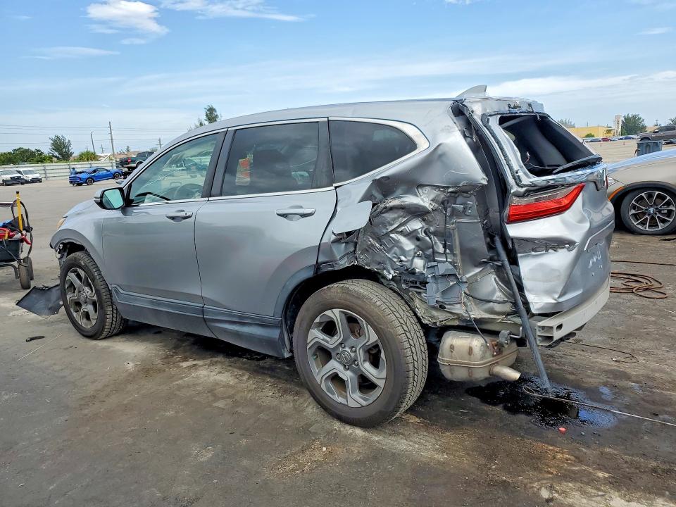 Photo 2 from auction – 2017 HONDA CR-V with VIN 7FARW1H8XHE016522