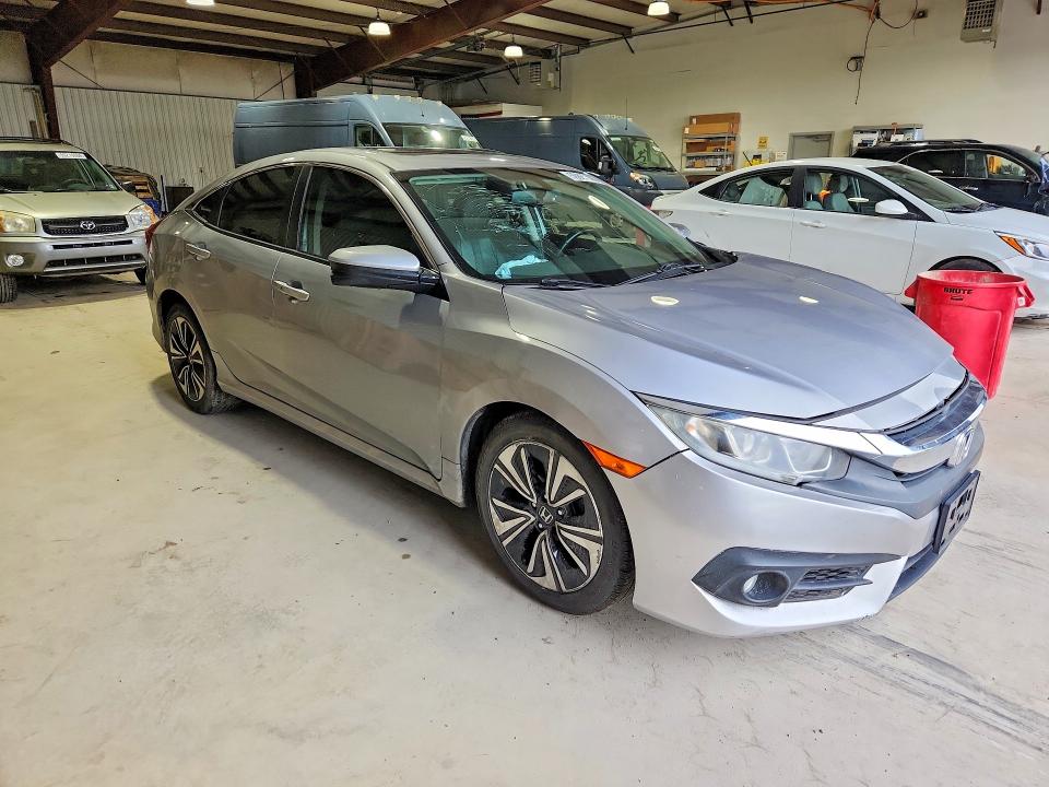 Photo 4 from auction – 2016 HONDA CIVIC with VIN 2HGFC1F77GH649037