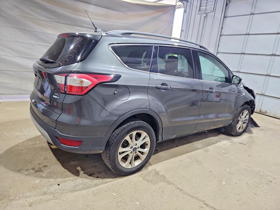 Photo 3 from auction – 2018 FORD ESCAPE SEL with VIN 1FMCU9HD3JUB50056