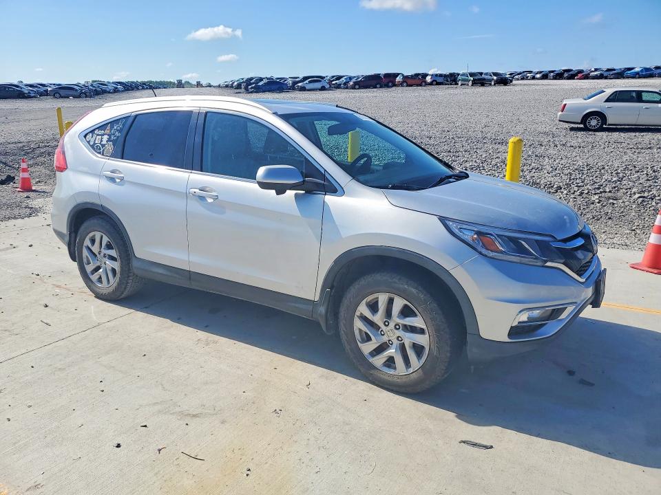 Photo 4 from auction – 2015 HONDA CR-V with VIN 2HKRM4H74FH615859