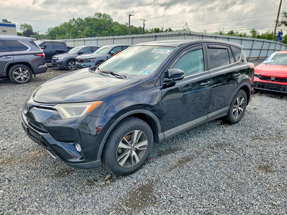 TOYOTA RAV4 2018 with VIN 2T3RFREV2JW807793 - Photo from auction