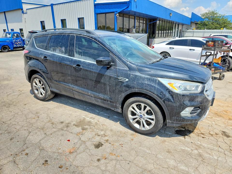 Photo 4 from auction – 2017 FORD ESCAPE with VIN 1FMCU9GD6HUD43300