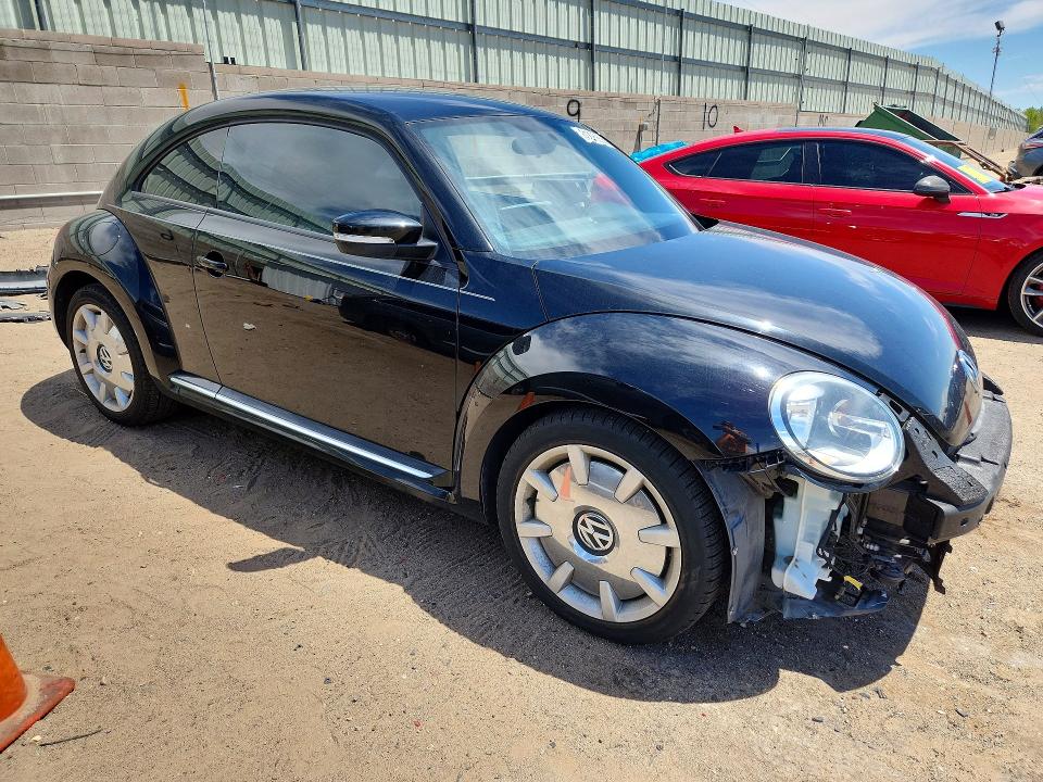 Photo 4 from auction – 2012 VOLKSWAGEN BEETLE with VIN 3VWJP7AT0CM642248