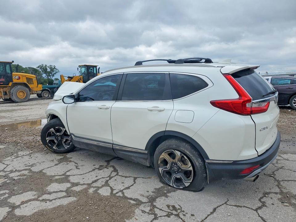 Photo 2 from auction – 2017 HONDA CR-V with VIN 2HKRW2H99HH100648