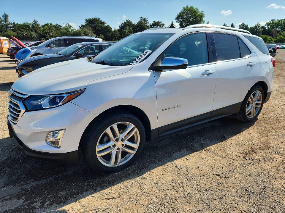CHEVROLET EQUINOX 2018 with VIN 2GNAXMEV4J6106852 - Photo from auction