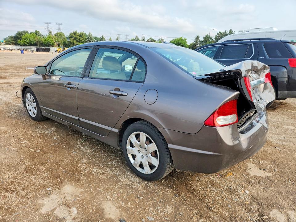 Photo 2 from auction – 2010 HONDA CIVIC with VIN 19XFA1F5XAE017123