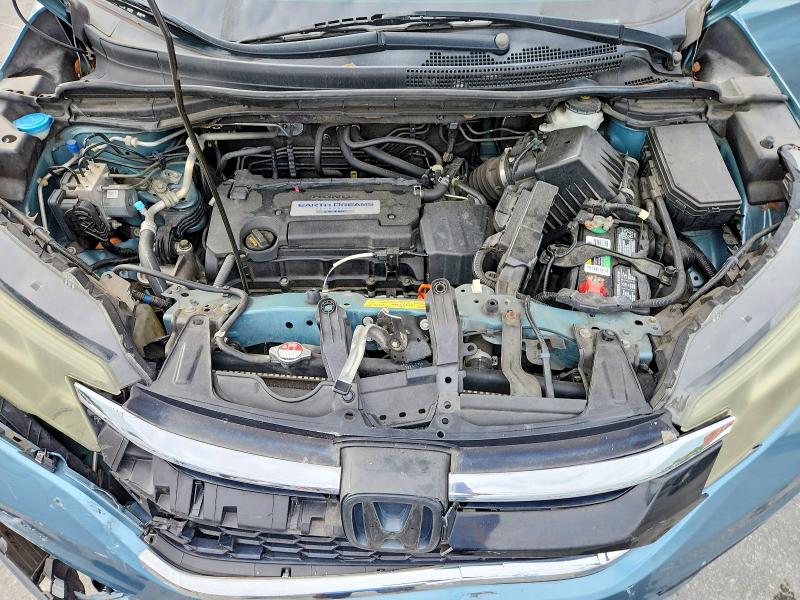 Photo 12 from auction – 2015 HONDA CR-V with VIN 2HKRM3H33FH552647