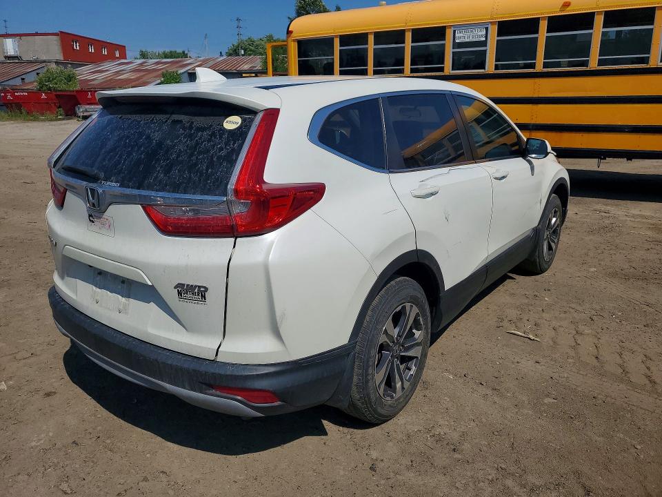 Photo 3 from auction – 2018 HONDA CR-V with VIN 2HKRW2H29JH123291