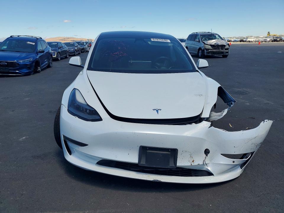 Photo 5 from auction – 2021 TESLA MODEL 3 with VIN 5YJ3E1EB7MF079589