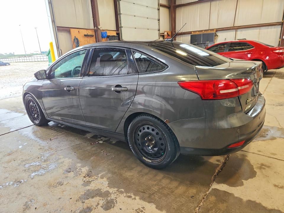 Photo 2 from auction – 2016 FORD FOCUS with VIN 1FADP3F23GL342029