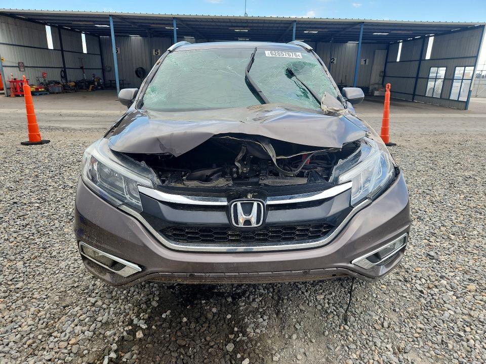 Photo 5 from auction – 2016 HONDA CR-V with VIN 2HKRM4H71GH626268