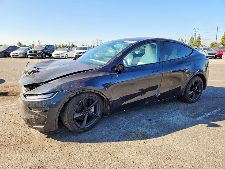 TESLA MODEL Y 2026 with VIN 7SAYGDED7TF559054 - Photo from auction