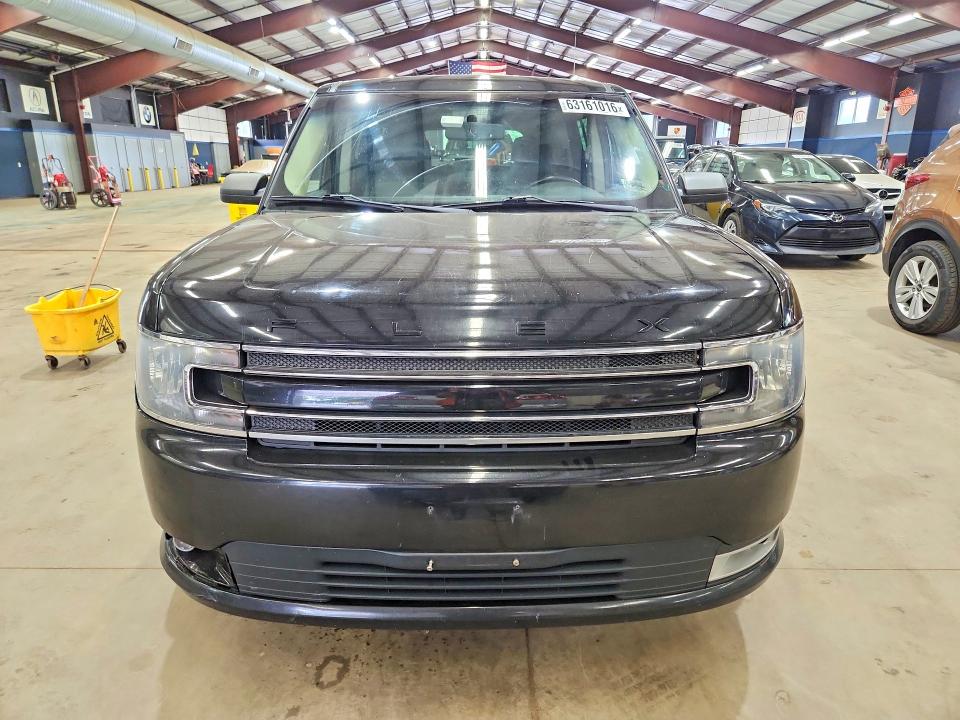 Photo 5 from auction – 2016 FORD FLEX with VIN 2FMHK6C83GBA09507