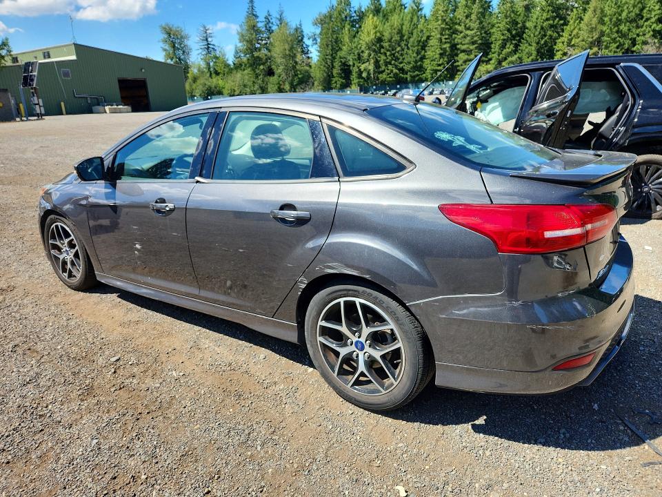 Photo 2 from auction – 2016 FORD FOCUS with VIN 1FADP3F28GL347016