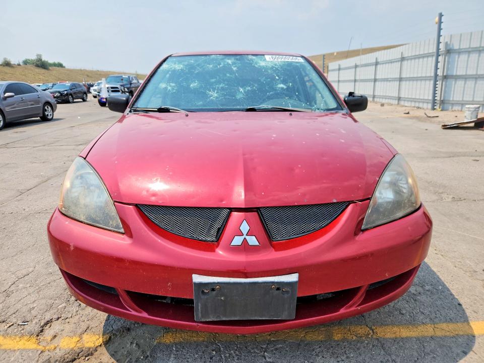 Photo 5 from auction – 2004 MITSUBISHI LANCER with VIN JA3AJ26E94U033530
