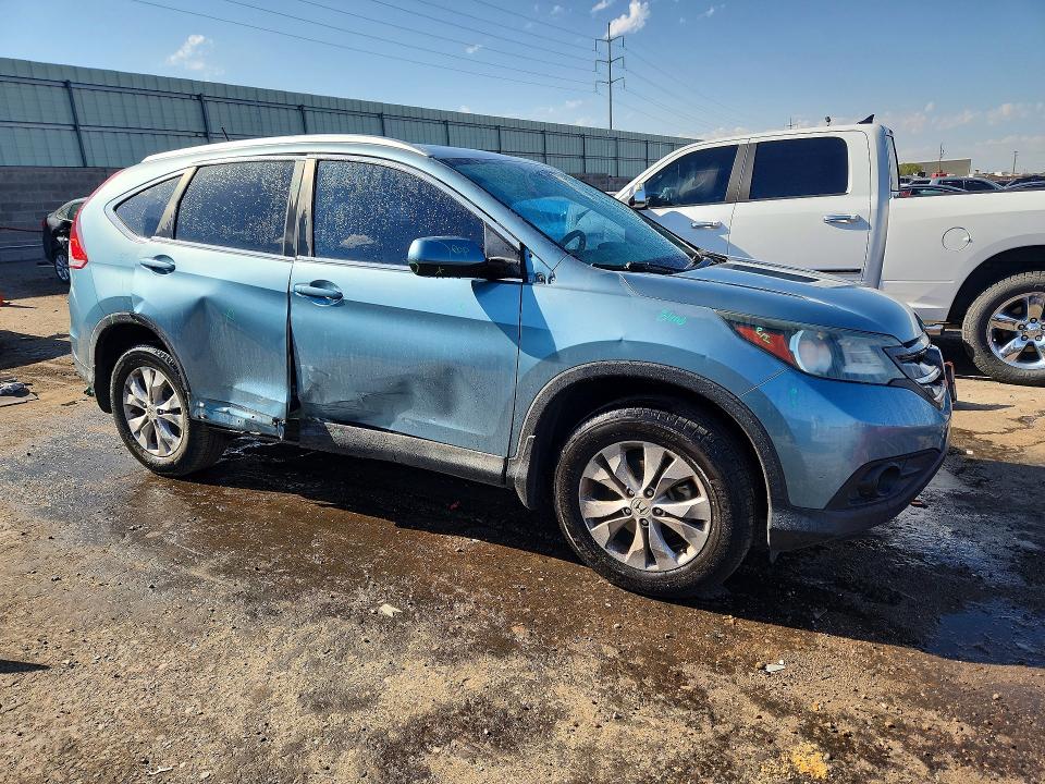 Photo 4 from auction – 2014 HONDA CR-V with VIN 2HKRM4H74EH656491