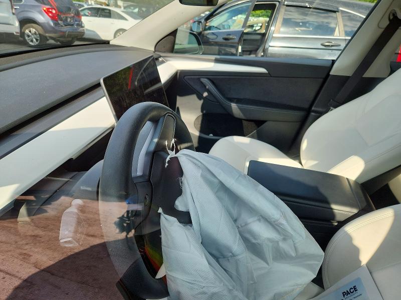 Photo 9 from auction – 2023 TESLA MODEL Y with VIN 7SAYGDEDXPF931119
