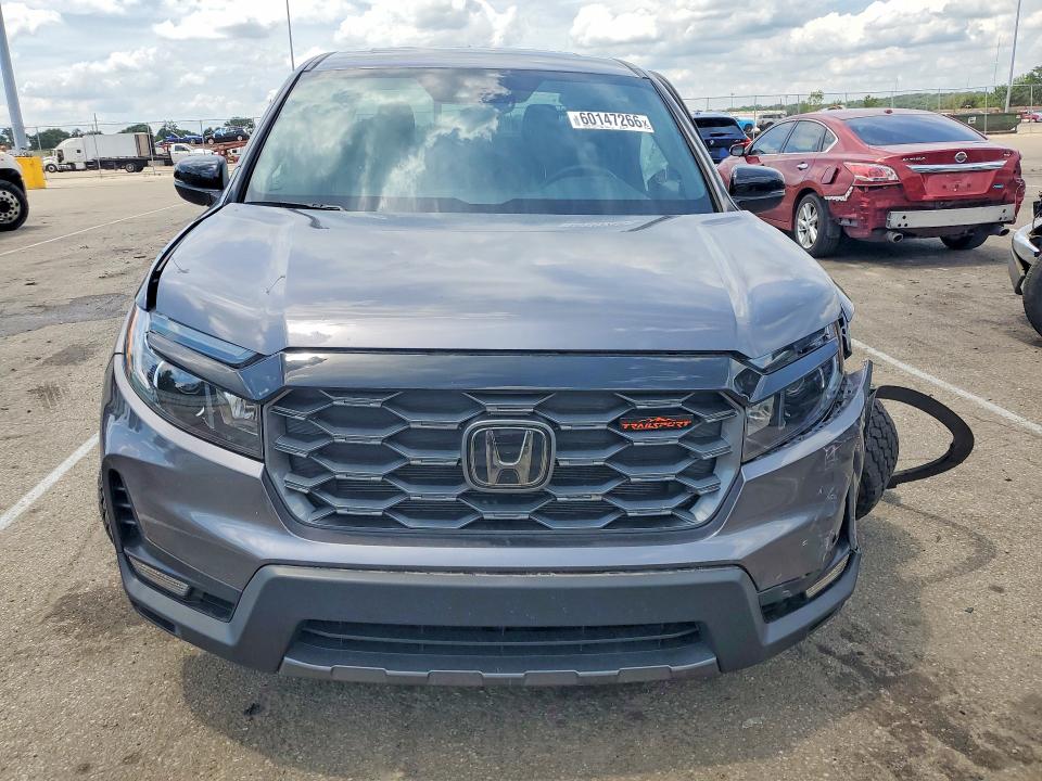 Photo 5 from auction – 2025 HONDA RIDGELINE with VIN 5FPYK3F6XSB010895