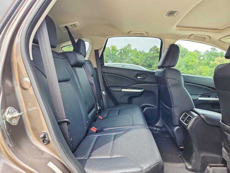 Photo 11 from auction – 2015 HONDA CR-V with VIN 2HKRM4H73FH617019
