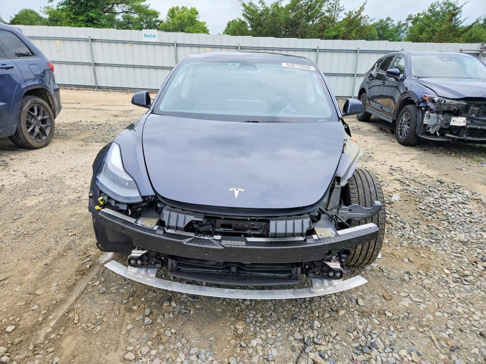 Photo 5 from auction – 2021 TESLA MODEL 3 with VIN 5YJ3E1EB4MF056299