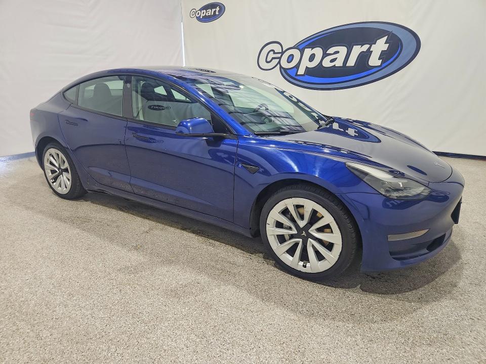 Photo 4 from auction – 2023 TESLA MODEL 3 with VIN 5YJ3E1EA4PF449943
