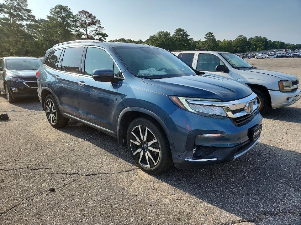 Photo 4 from auction – 2022 HONDA PILOT with VIN 5FNYF5H68NB013403