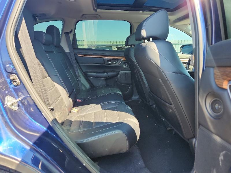 Photo 11 from auction – 2018 HONDA CR-V with VIN 2HKRW2H97JH101609