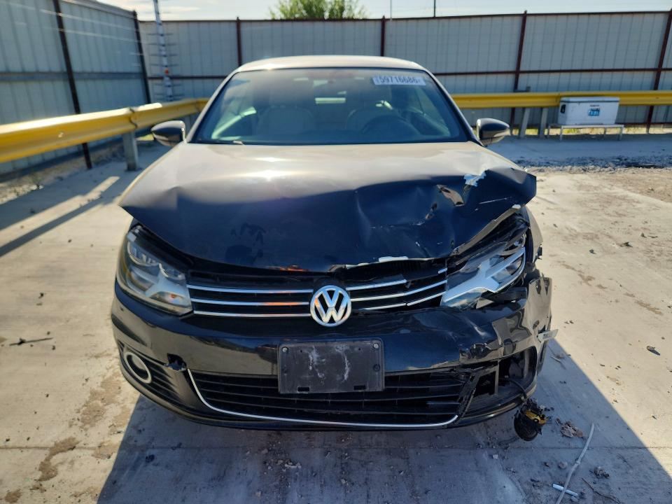 Photo 5 from auction – 2015 VOLKSWAGEN EOS with VIN WVWBW8AH7FV002236