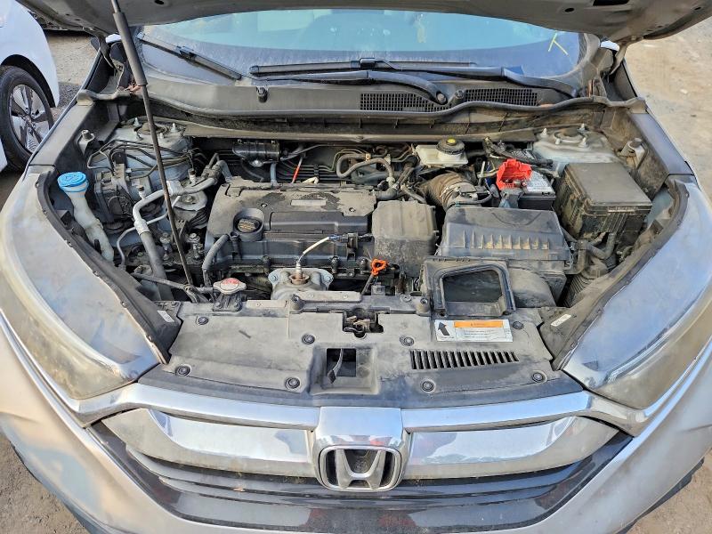 Photo 11 from auction – 2018 HONDA CR-V with VIN 2HKRW5H38JH415444