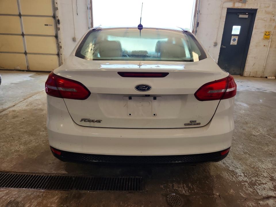 Photo 6 from auction – 2015 FORD FOCUS with VIN 1FADP3F21FL328810