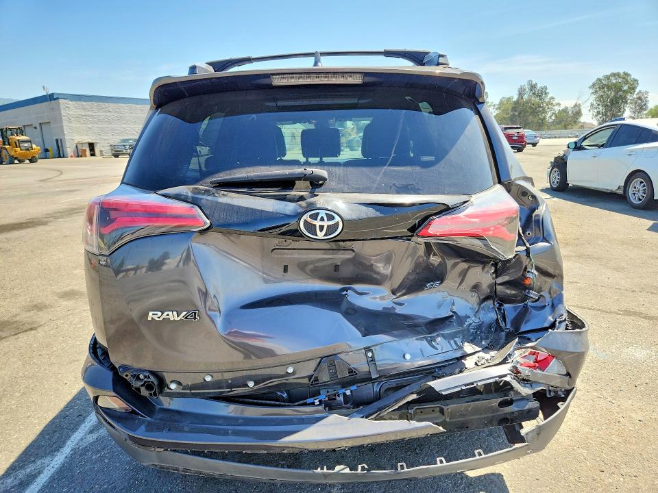 Photo 6 from auction – 2018 TOYOTA RAV4 with VIN JTMNFREV7JJ194650