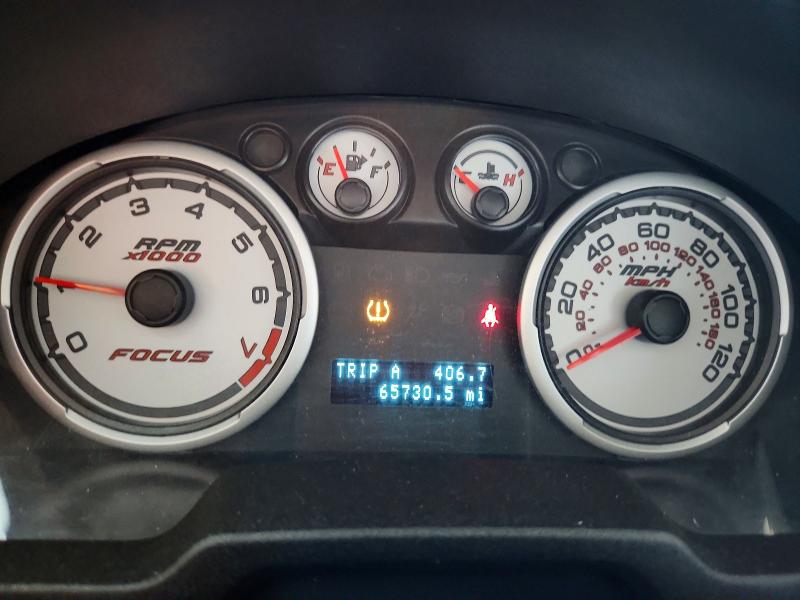 Photo 9 from auction – 2011 FORD FOCUS with VIN 1FAHP3EN2BW103740