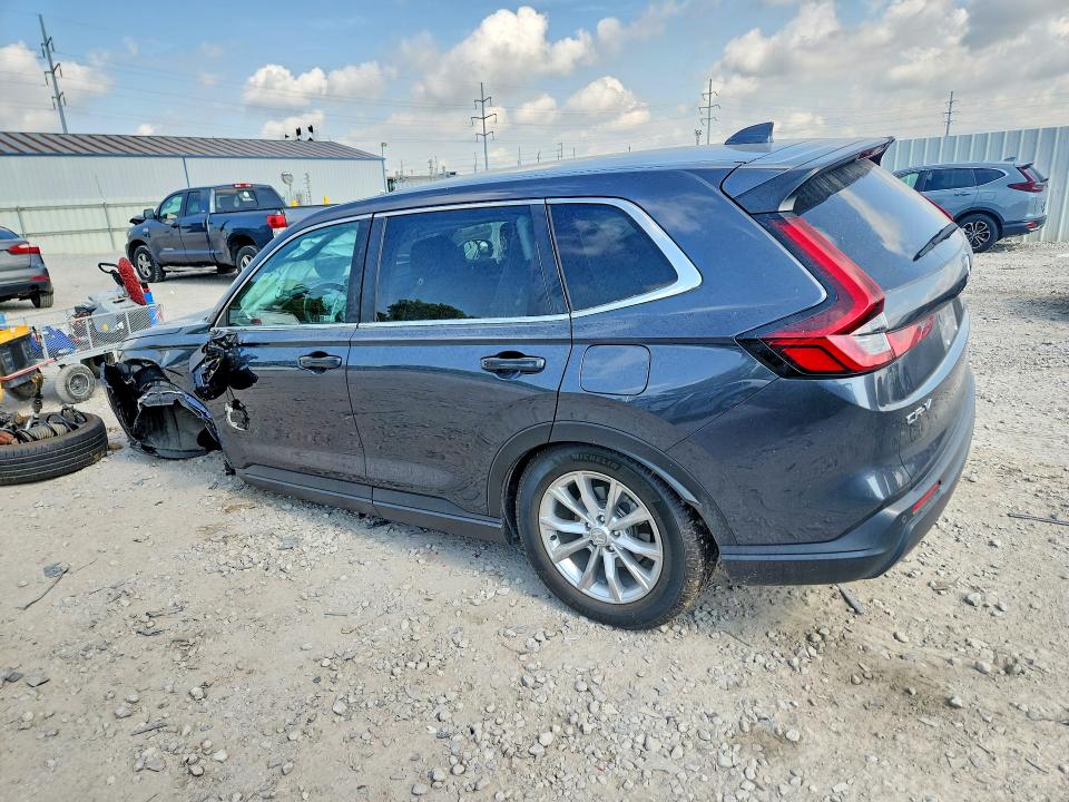 Photo 2 from auction – 2023 HONDA CR-V with VIN 2HKRS4H76PH439906