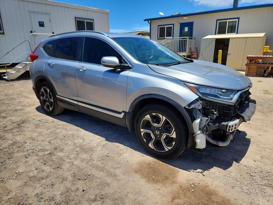 Photo 4 from auction – 2017 HONDA CR-V with VIN 2HKRW1H90HH504688