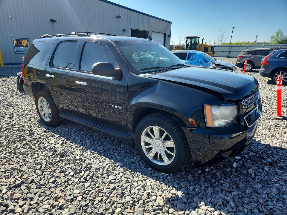 Photo 4 from auction – 2011 CHEVROLET TAHOE with VIN 1GNSKBE06BR346003