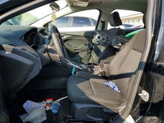 Foto 7 de la subasta – 2016 FORD FOCUS con VIN 1FADP3F24GL359048