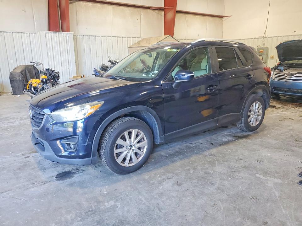 MAZDA CX-5 2016 with VIN JM3KE4CYXG0640334 - Photo from auction
