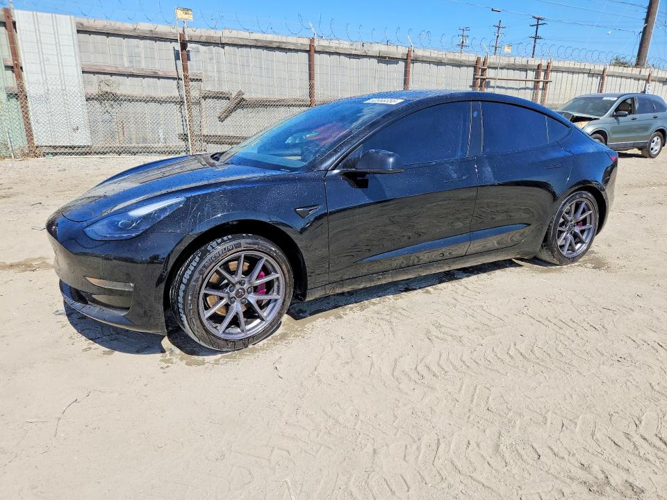 TESLA MODEL 3 2021 with VIN 5YJ3E1EB5MF068087 - Photo from auction
