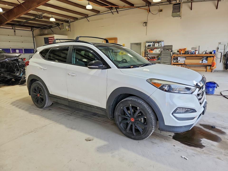 Photo 4 from auction – 2017 HYUNDAI TUCSON with VIN KM8J3CA25HU537833