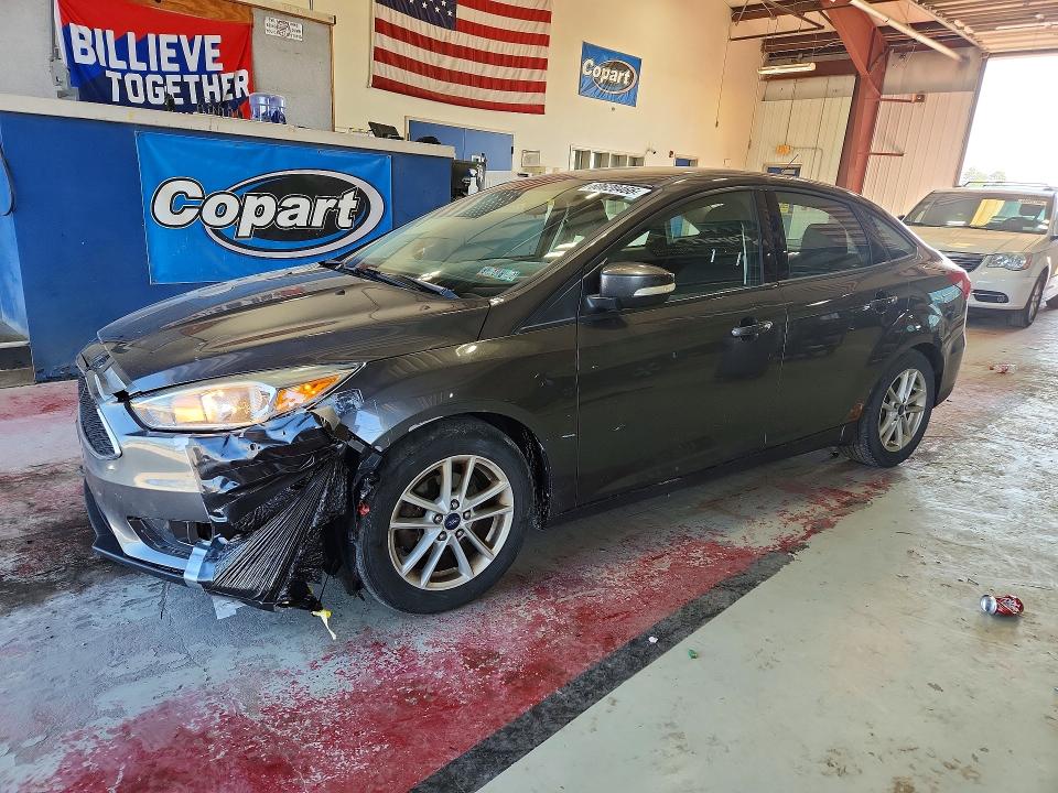 FORD FOCUS 2015 with VIN 1FADP3F21FL237827 - Photo from auction