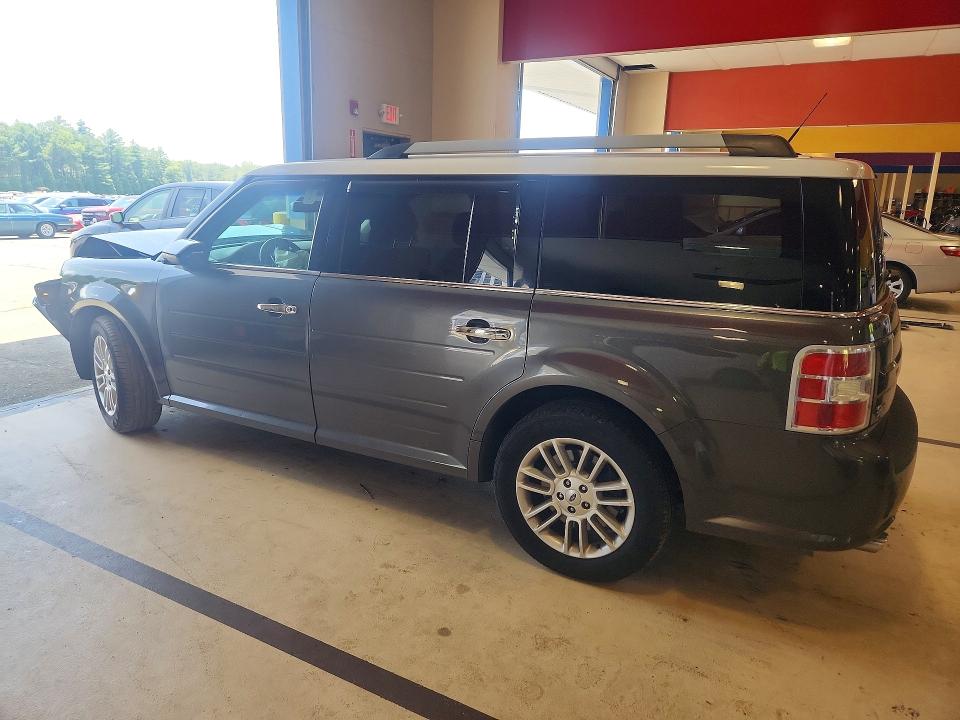 Photo 2 from auction – 2016 FORD FLEX with VIN 2FMHK6C84GBA22766