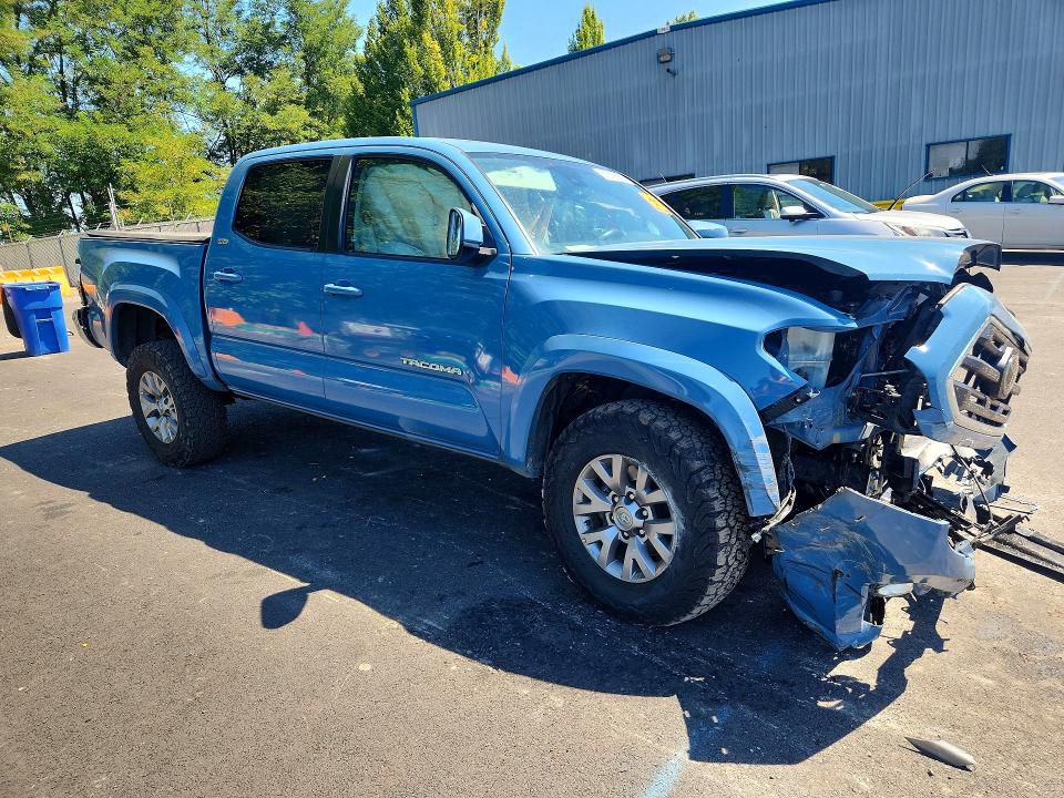 Photo 4 from auction – 2019 TOYOTA TACOMA with VIN 3TMCZ5AN1KM201058