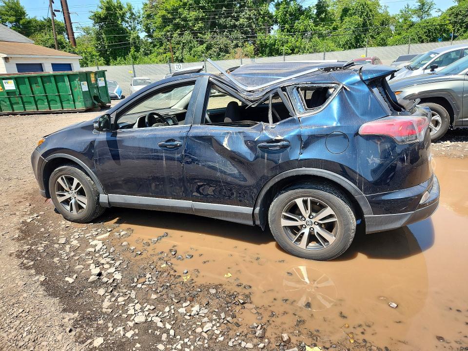 Photo 2 from auction – 2018 TOYOTA RAV4 with VIN JTMRFREV7JJ745368