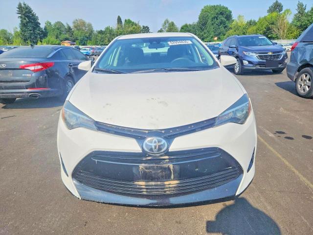 Photo 5 from auction – 2017 TOYOTA COROLLA with VIN 5YFBURHE3HP712327