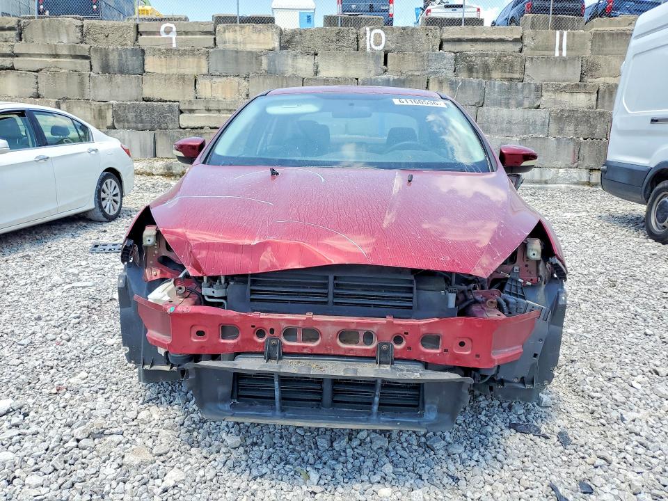Photo 5 from auction – 2016 FORD FOCUS with VIN 1FADP3F20GL301079