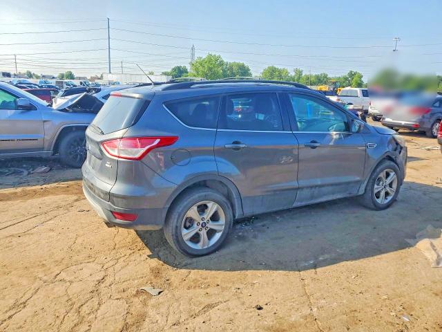 Photo 3 from auction – 2016 FORD ESCAPE with VIN 1FMCU9GX3GUA65531