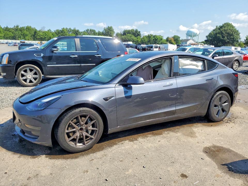 TESLA MODEL 3 2023 with VIN 5YJ3E1EA5PF652422 - Photo from auction