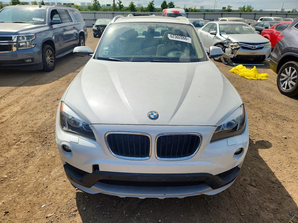 Photo 5 from auction – 2015 BMW X1 with VIN WBAVL1C50FVY39889