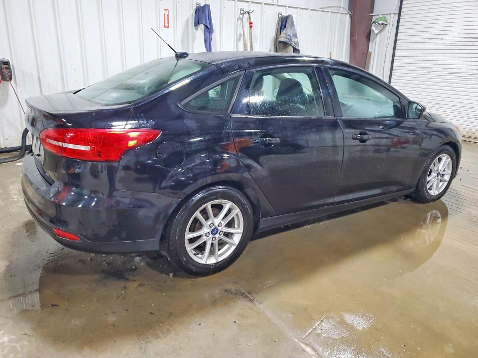 Photo 3 from auction – 2016 FORD FOCUS with VIN 1FADP3F29GL274657