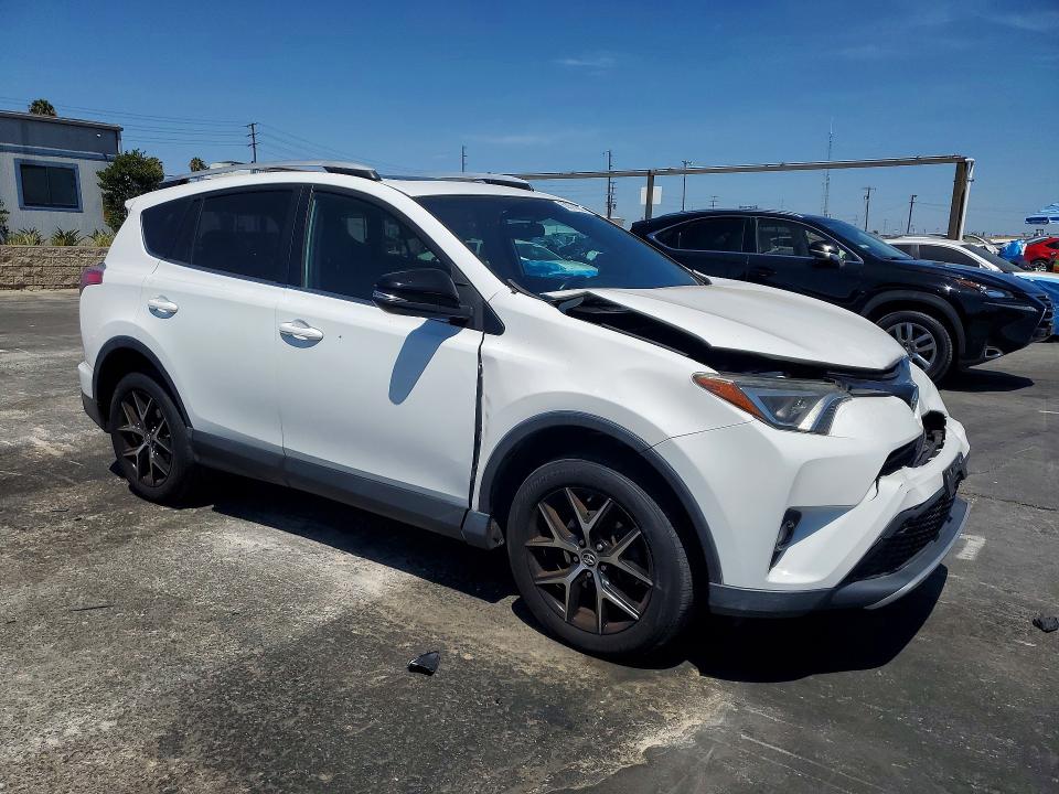 Photo 4 from auction – 2016 TOYOTA RAV4 with VIN 2T3NFREV5GW305142